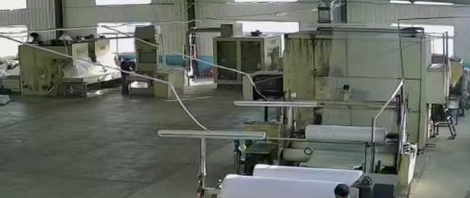 日照地区处理开包机 开松机 预梳理机 交叉铺网机 精梳理机 烘箱 成卷 分切等热风无纺布生产设备