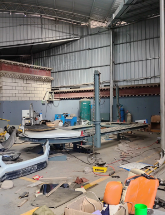 拉萨地区处理龙门举升机 洗车机 工位桌 货架 拆胎机 空压机 大梁校正仪 四轮定位仪 储气罐 工具车等汽修厂整体设备