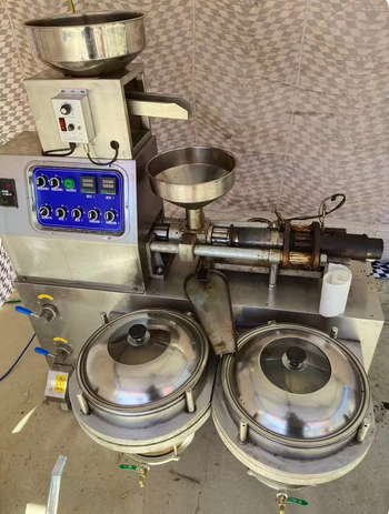 天津地区处理麻酱机，香油压榨机，炒料机