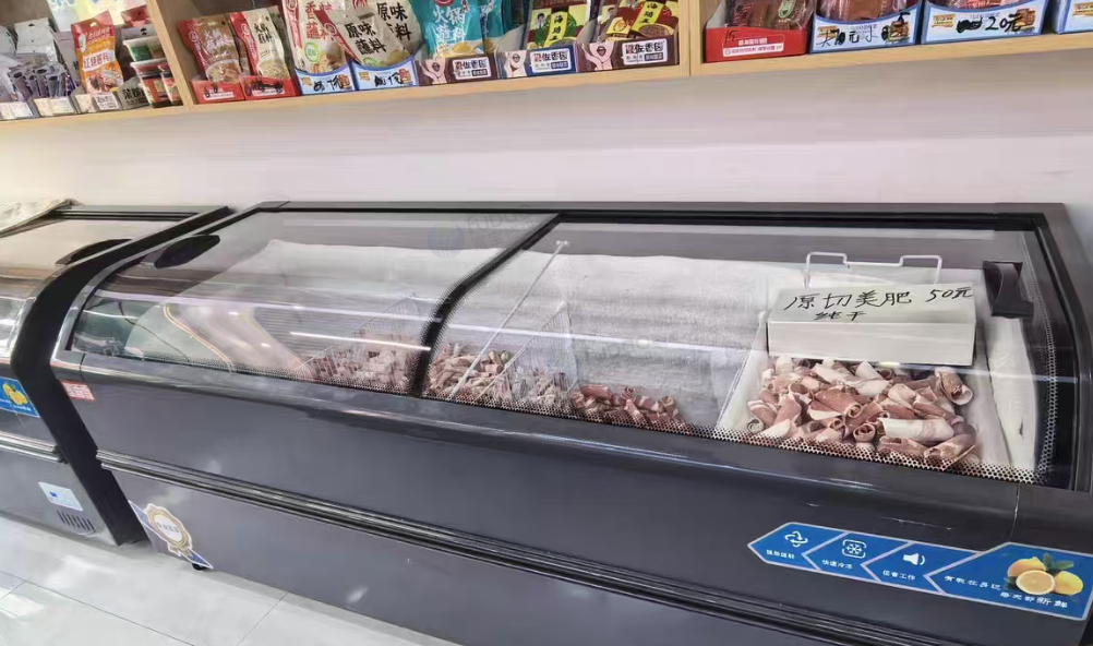 通化市地区商铺处理切肉机，卧式冰柜，商用弧形展示冰柜等