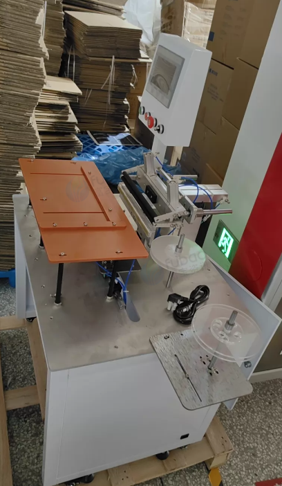 温州地区处理色纸包边机2台