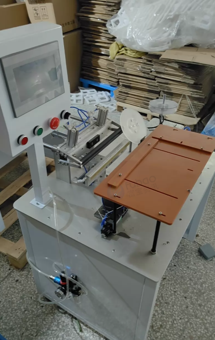 温州地区处理色纸包边机2台