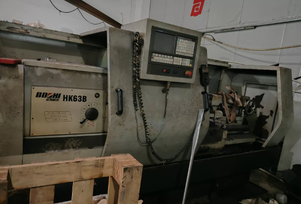 苏州市地区工厂处理宝鸡车床1台、张家港华明机械塑料板下料机1台